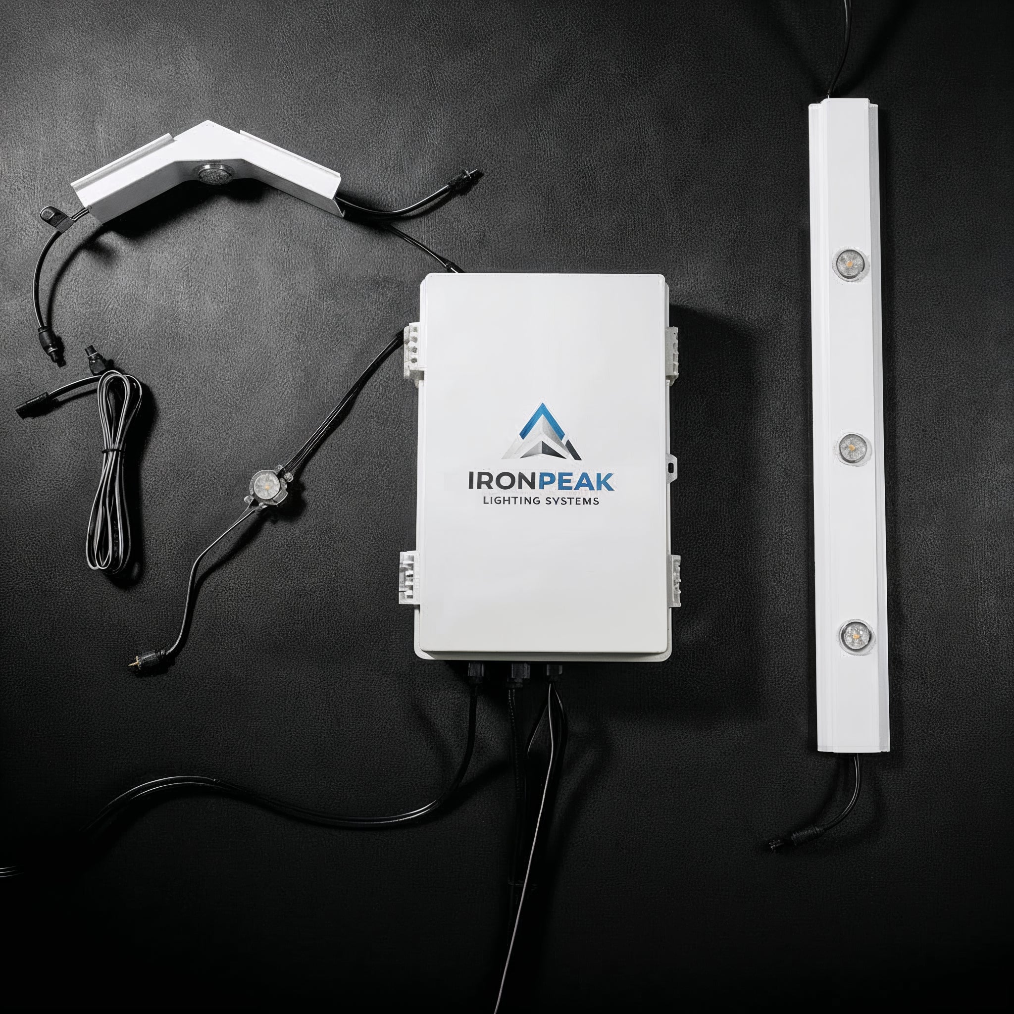 200 ft Roofline Kit — controller, track and two pre-built Apex peaks on a dark studio background